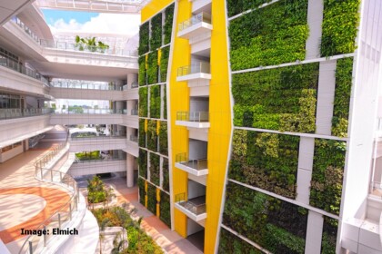 Large-scale outdoor living walls spanning multiple floors of a contemporary building exterior.