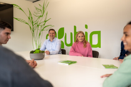 Exubia team in boardroom at HQ